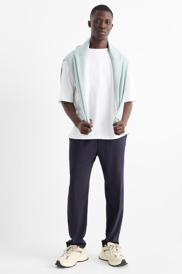 Uomo - Pantaloni chino - tapered fit - blu scuro