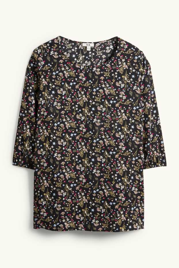 Dona - Brusa - de flors - negre