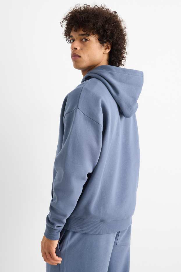 Home - Dessuadora oversized amb caputxa - blau