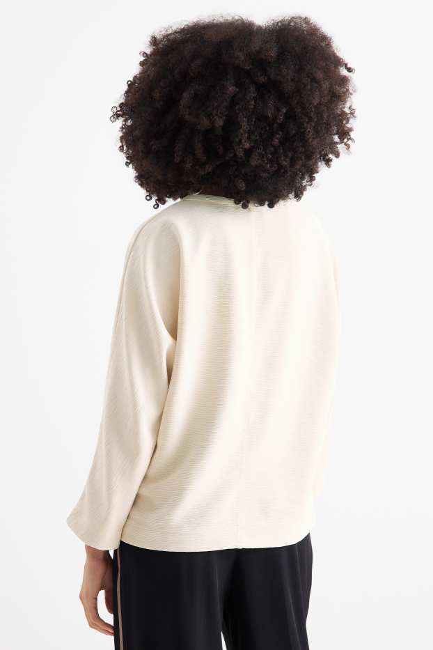 Dona - Dessuadora - acanalada - beix clar