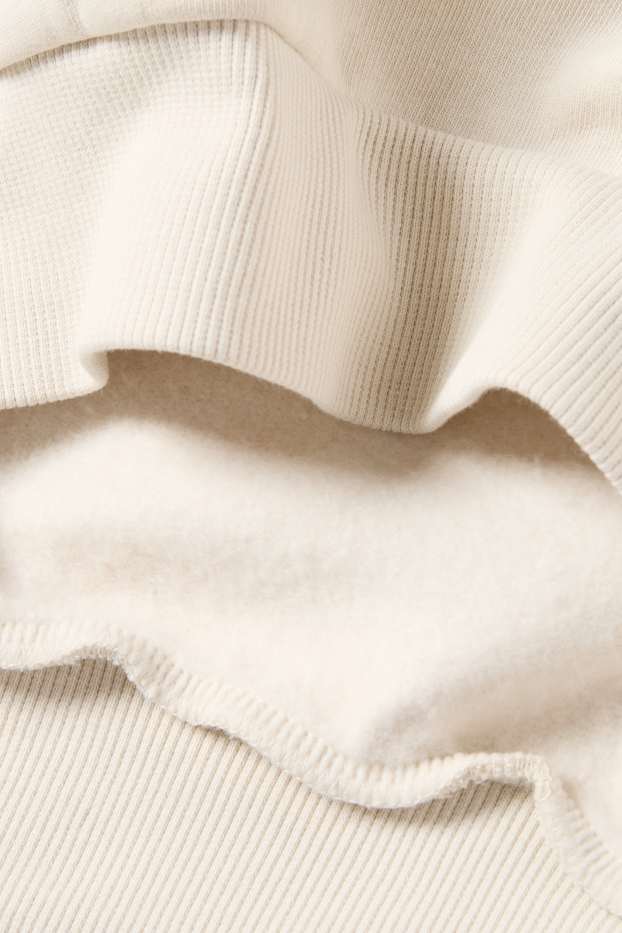 Dona - Dessuadora oversized - beix clar