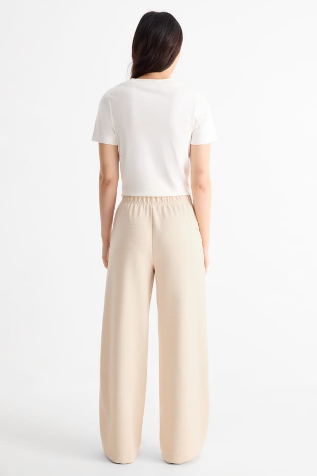 Femmes - Pantalon en jersey - mid waist - regular fit - finition texturée - beige clair