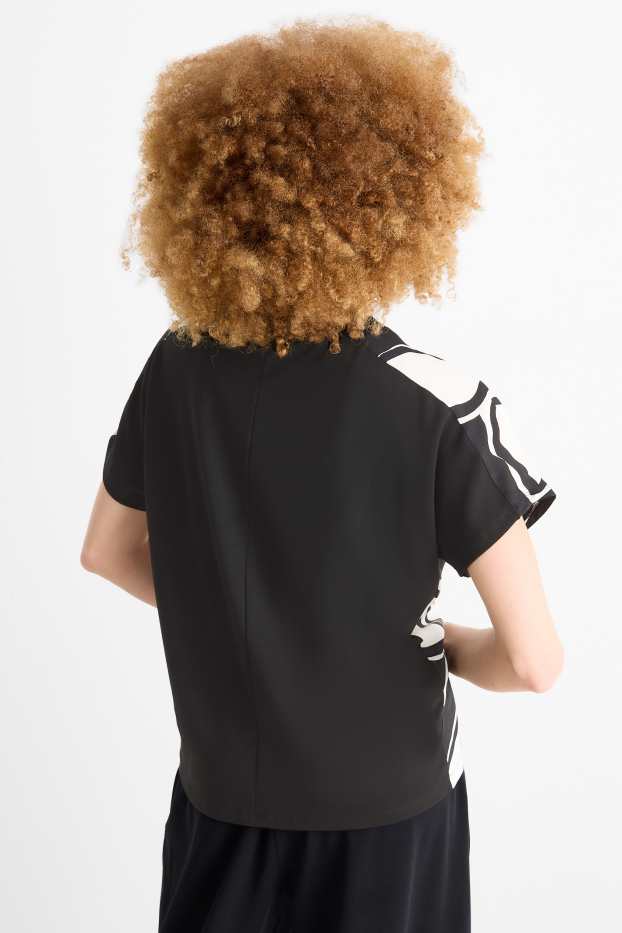 Donna - T-shirt - relaxed fit - a fiori - nero / beige