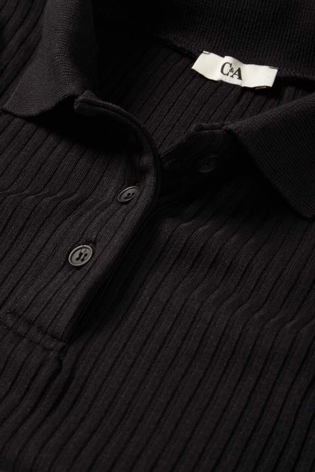 Dona - Polo - slim fit - acanalat - negre