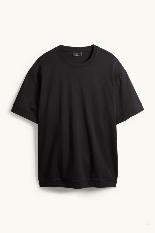 Heren - T-shirt - relaxed fit - zwart