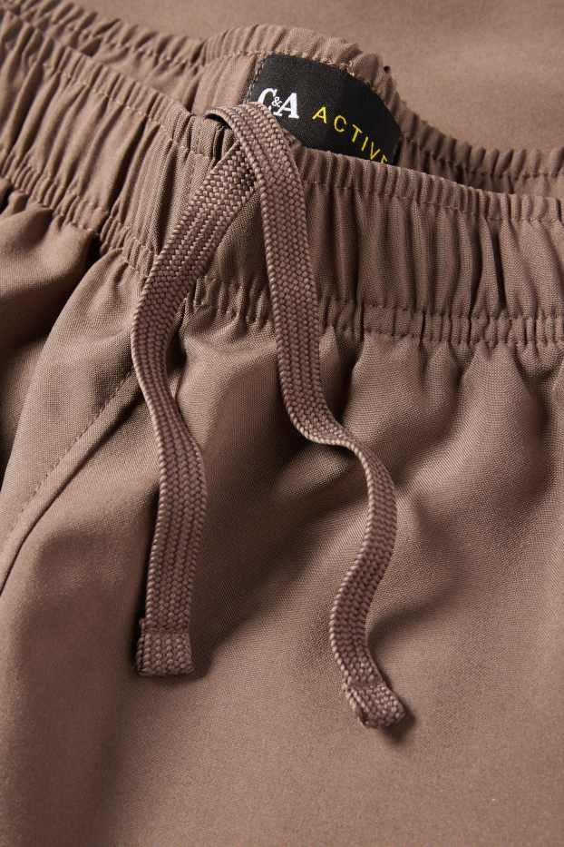 Hombre - Shorts funcionales - topo