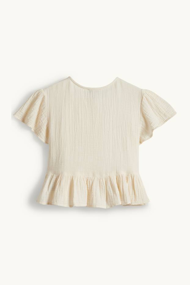 Kinderen: meisjes - Bloem - blouse van mousseline - beige