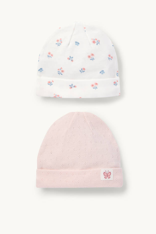 Bébés filles - Lot de 2 - petits fleurs et papillon - bonnet bébé - blanc / rose