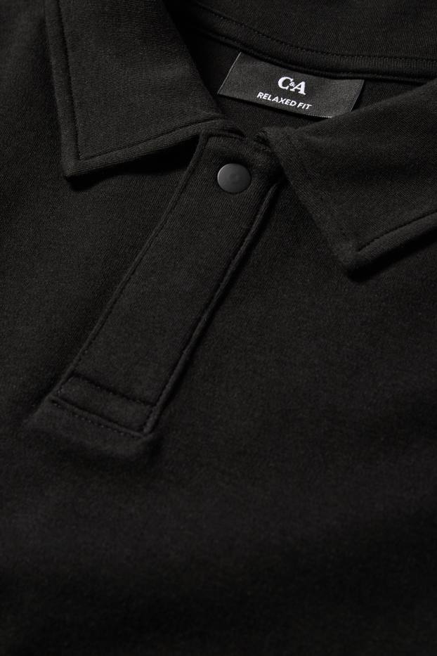 Heren - Poloshirt - relaxed fit - zwart