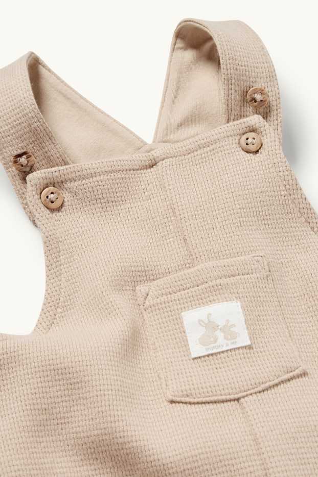 Unisex - Zajíčci - kalhoty s laclem pro miminka - strukturované - béžová