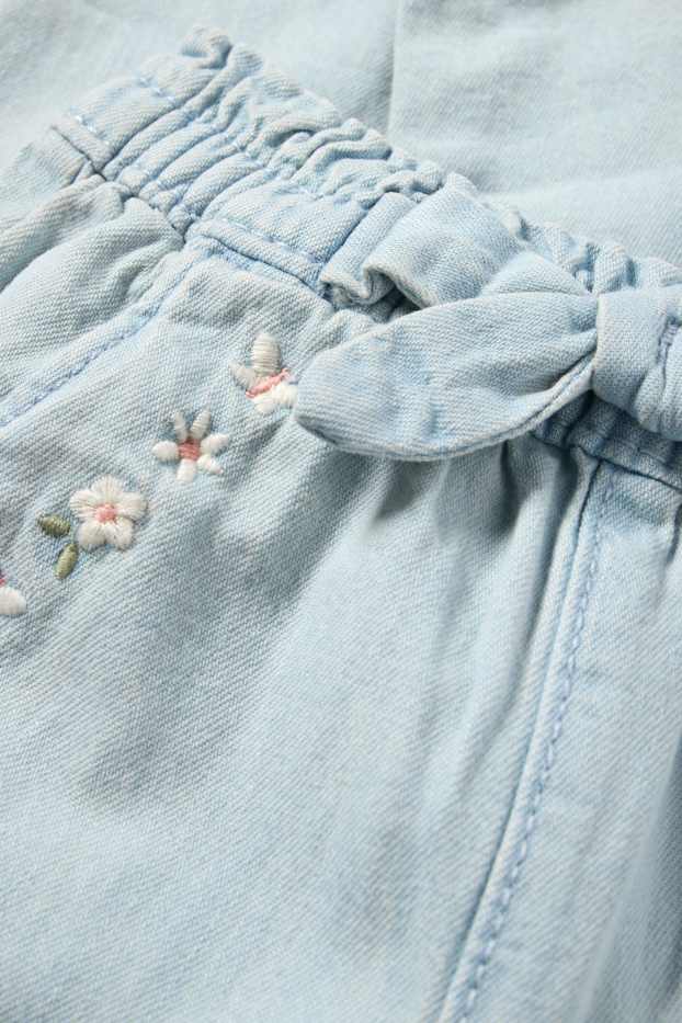 Nadó nena - Floretes - texans per a nadó - texà blau clar