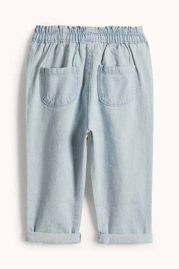 Nadó nena - Floretes - texans per a nadó - texà blau clar