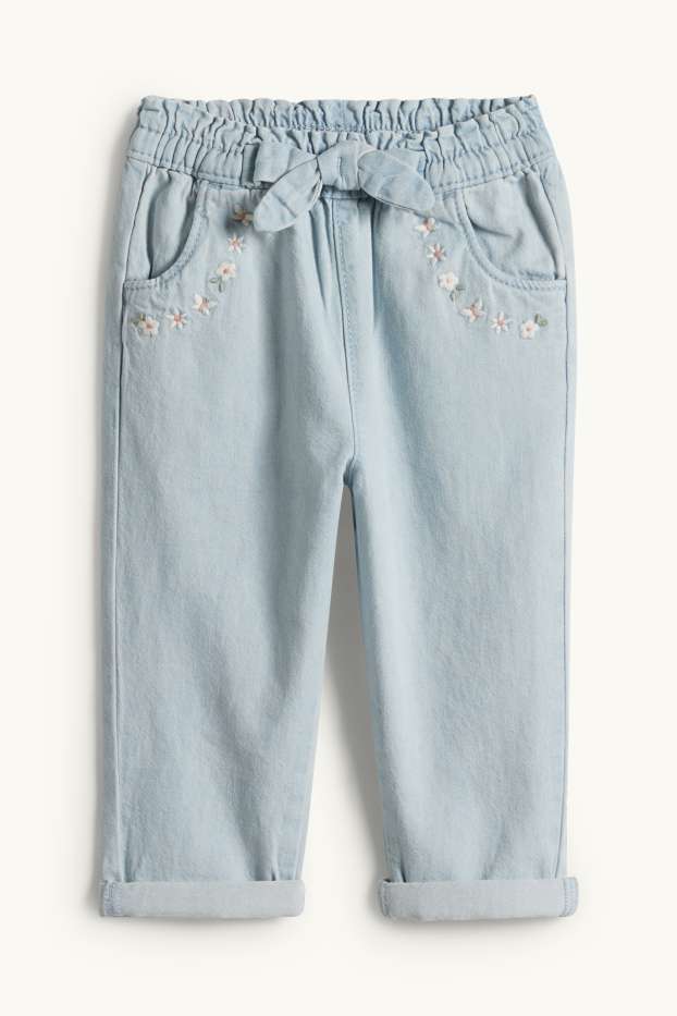 Nadó nena - Floretes - texans per a nadó - texà blau clar