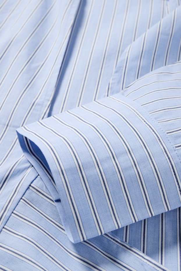 Dames - Blouse met V-hals en geknoopt detail - gestreept - lichtblauw