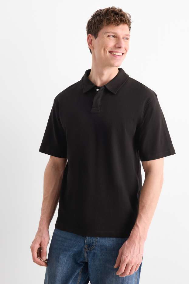 Heren - Poloshirt - relaxed fit - zwart