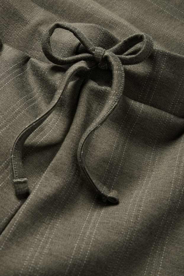 Dámské - Žerzejové kalhoty - mid waist - wide leg - s úzkými proužky - zelená