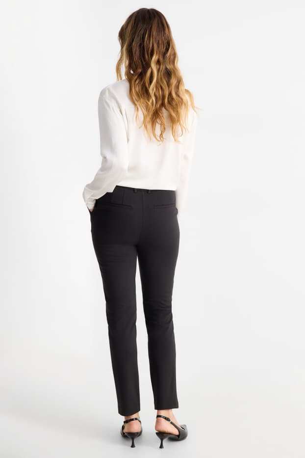 Femei - Pantaloni din jerseu - talie înaltă - tapered fit - negru