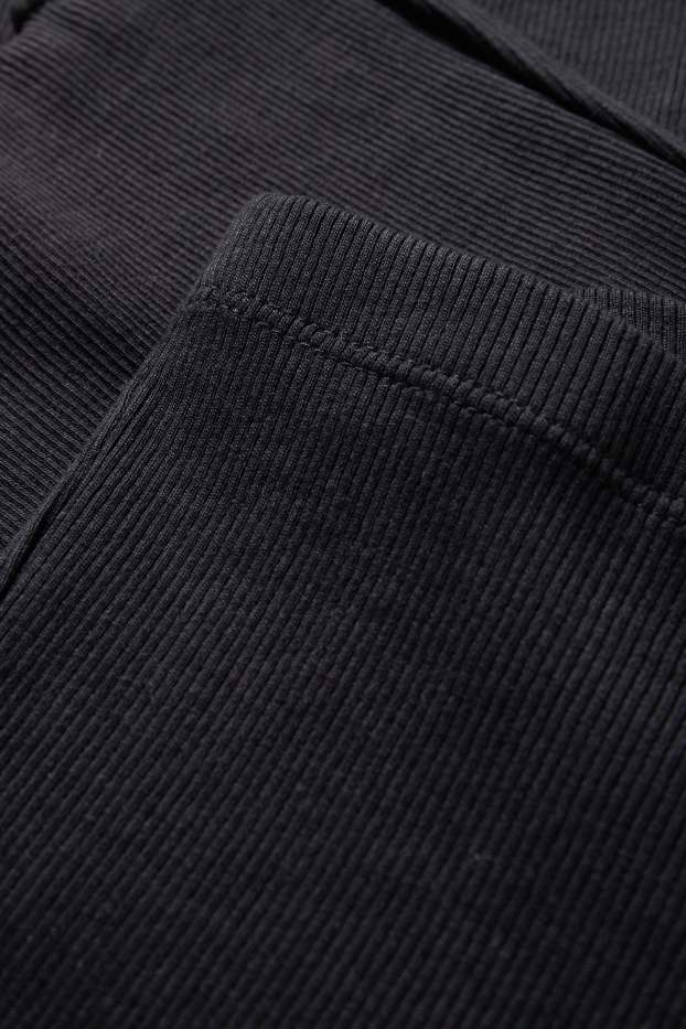 Kinderen: meisjes - Set van 2 - flared legging - ribstof - zwart