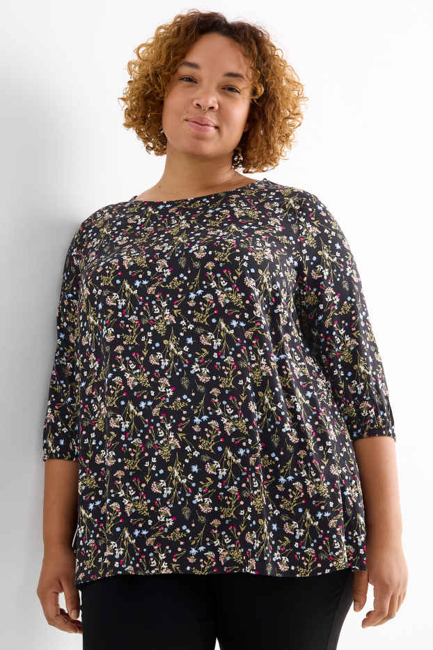 Dona - Brusa - de flors - negre