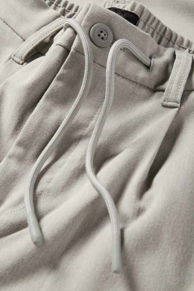 Home - Xinos - tapered fit - gris clar