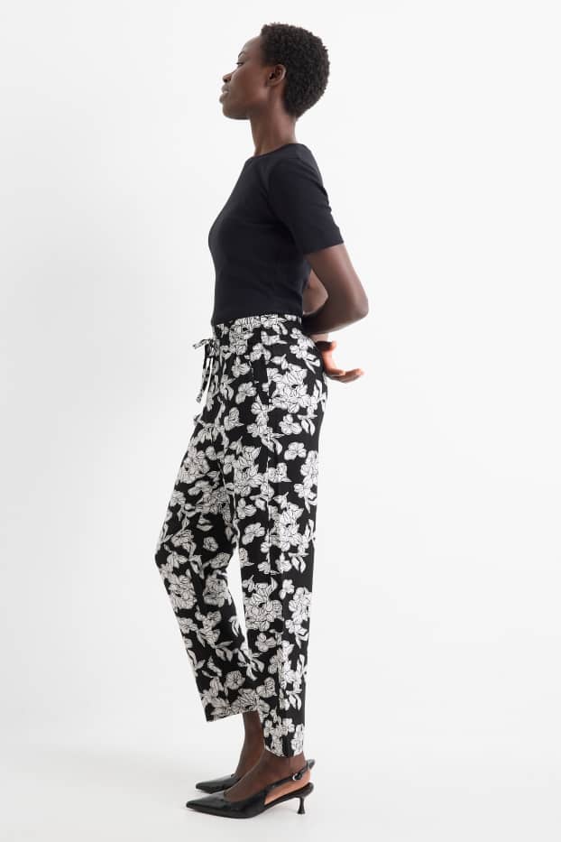 Women - Cloth trousers - high waist - tapered fit - floral - black / white