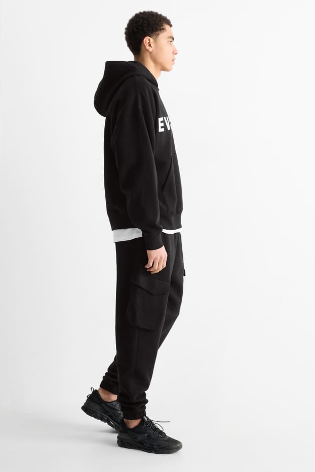 Pánské - Cargo teplákové kalhoty - černá