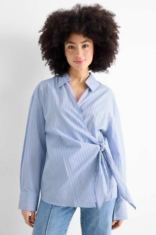 Dames - Blouse met V-hals en geknoopt detail - gestreept - lichtblauw