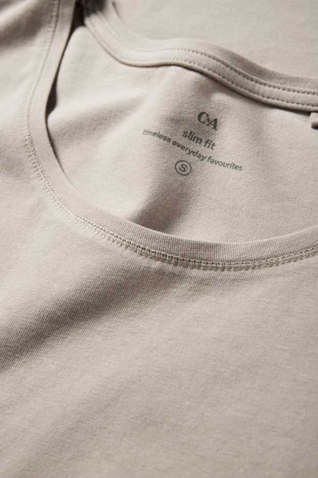 Dames - T-shirt - slim fit - licht beige