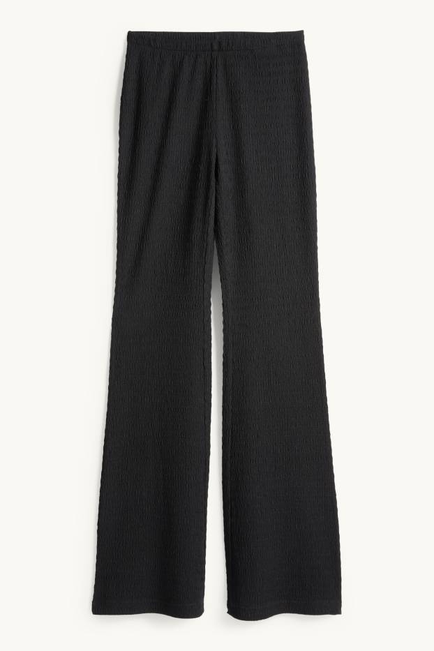 Dámské - Flared legíny - strukturované - černá