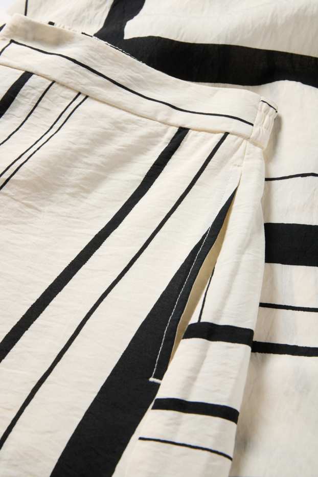 Dona - Pantalons culotte - high waist - wide leg - estampats - negre/beix