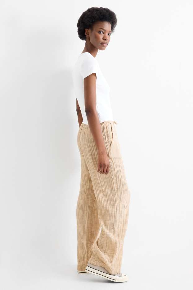 Dámské - Plátěné kalhoty - mid waist - loose fit - béžová
