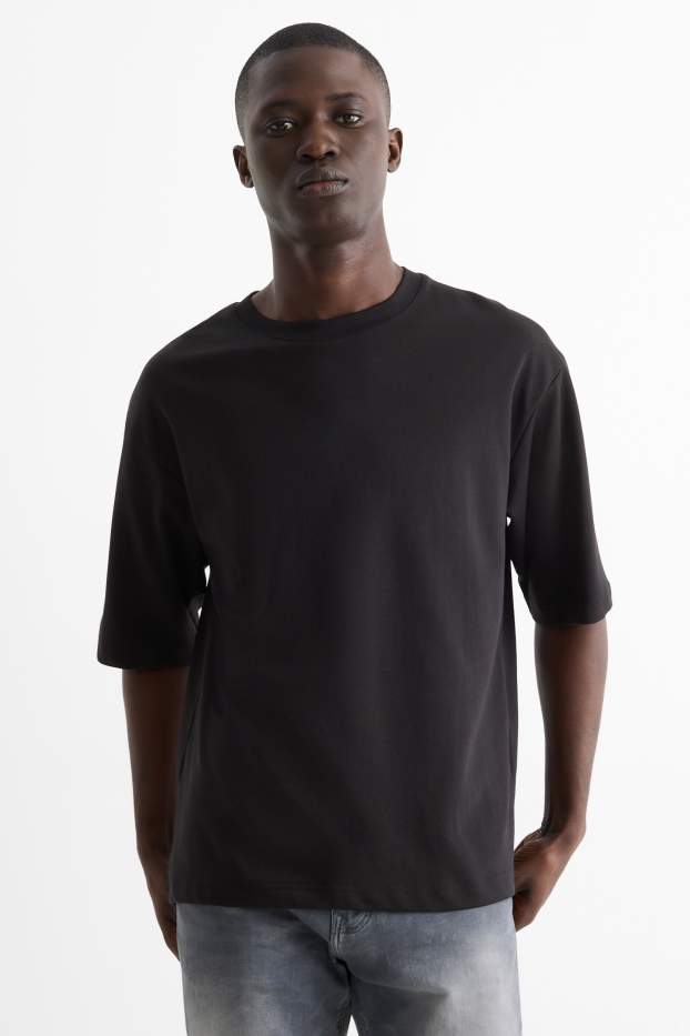 Herren - T-Shirt - Relaxed Fit - schwarz