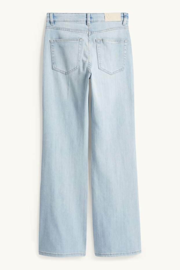 Femei - Flared jeans - talie medie - albastru deschis