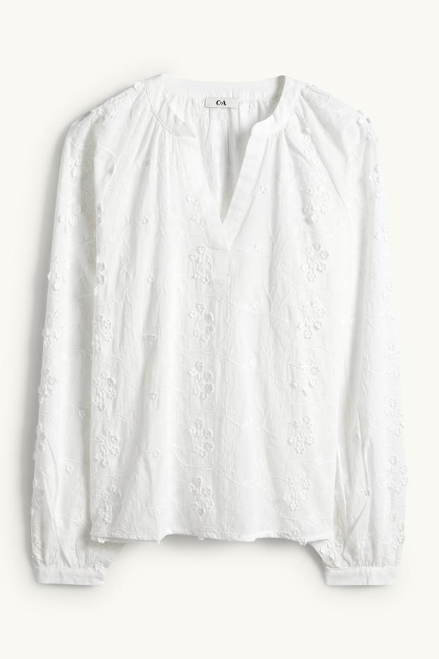 Dona - Brusa amb coll en punta - de flors - texturada - blanc