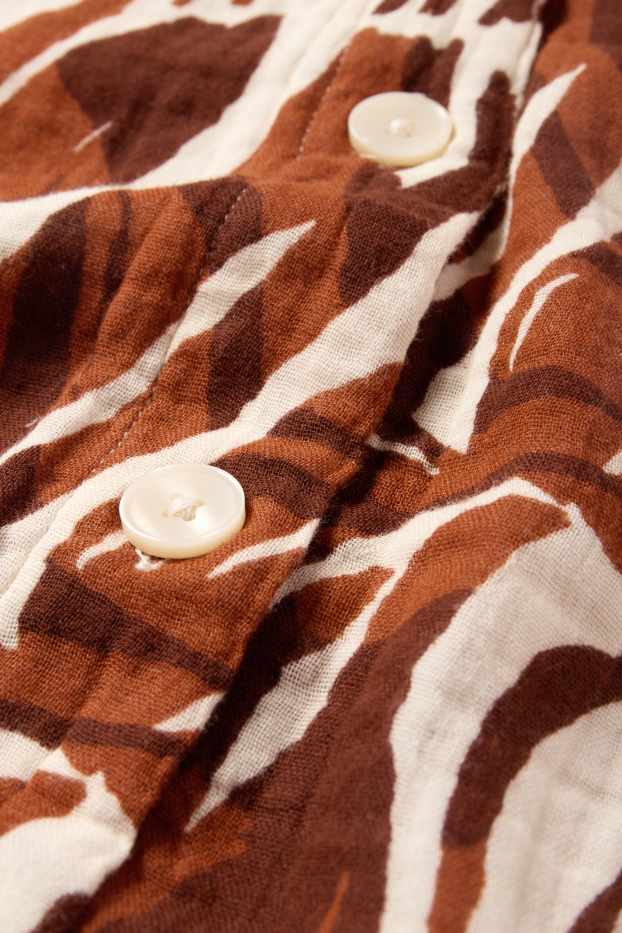 Dona - Armilla - estampada - beix/marró