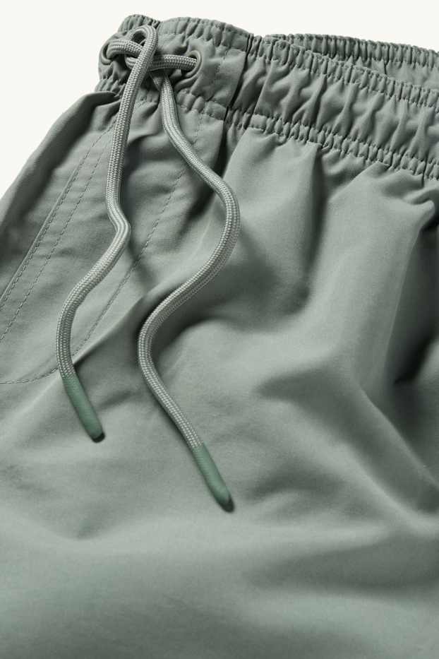 Herren - Badeshorts - grün