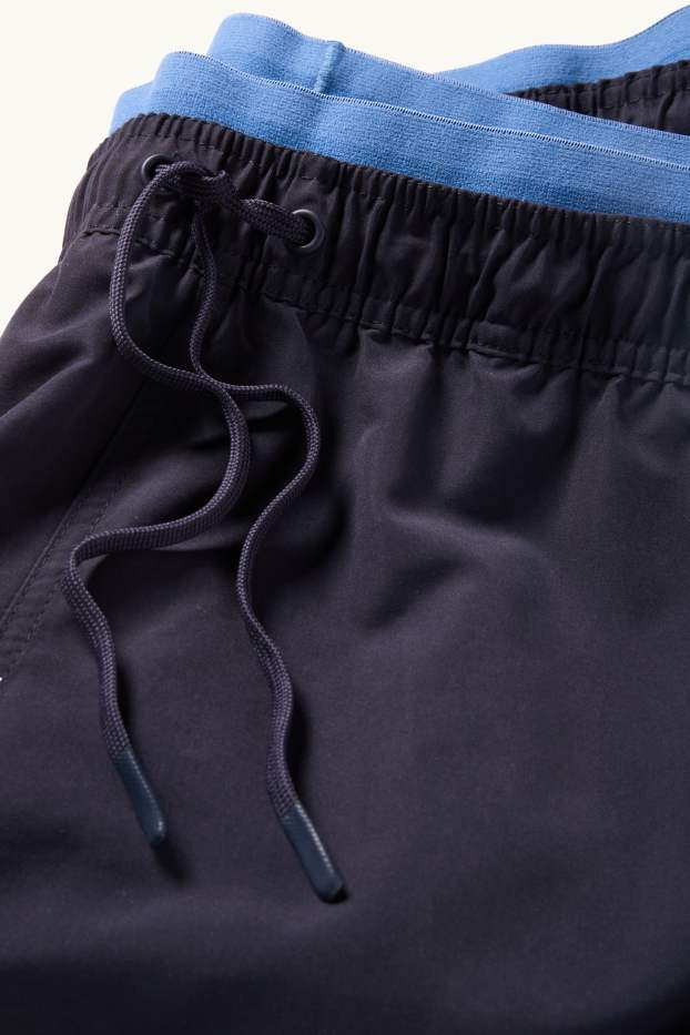 Hommes - Short de bain - look deux-en-un - bleu foncé