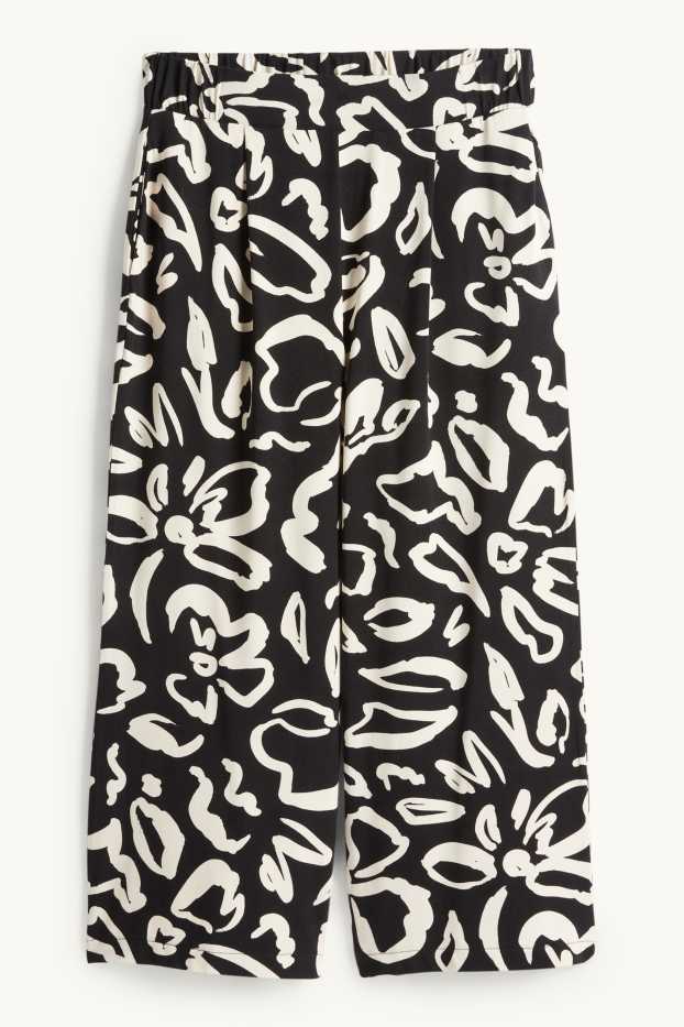 Donna - Pantaloni in jersey - vita media - straight fit - a fiori - nero / beige