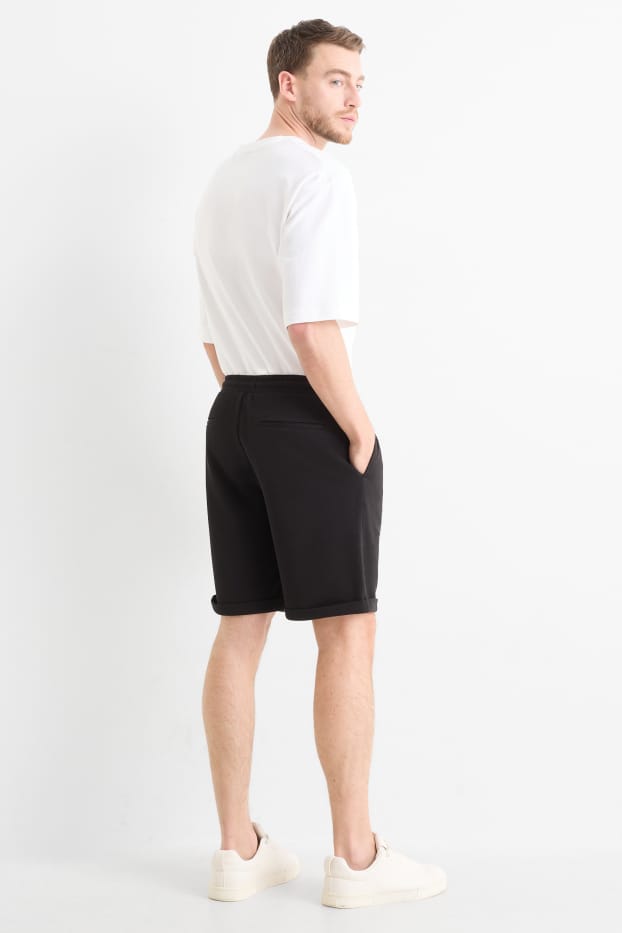 Uomo - Shorts di felpa - tessuto tramato - nero