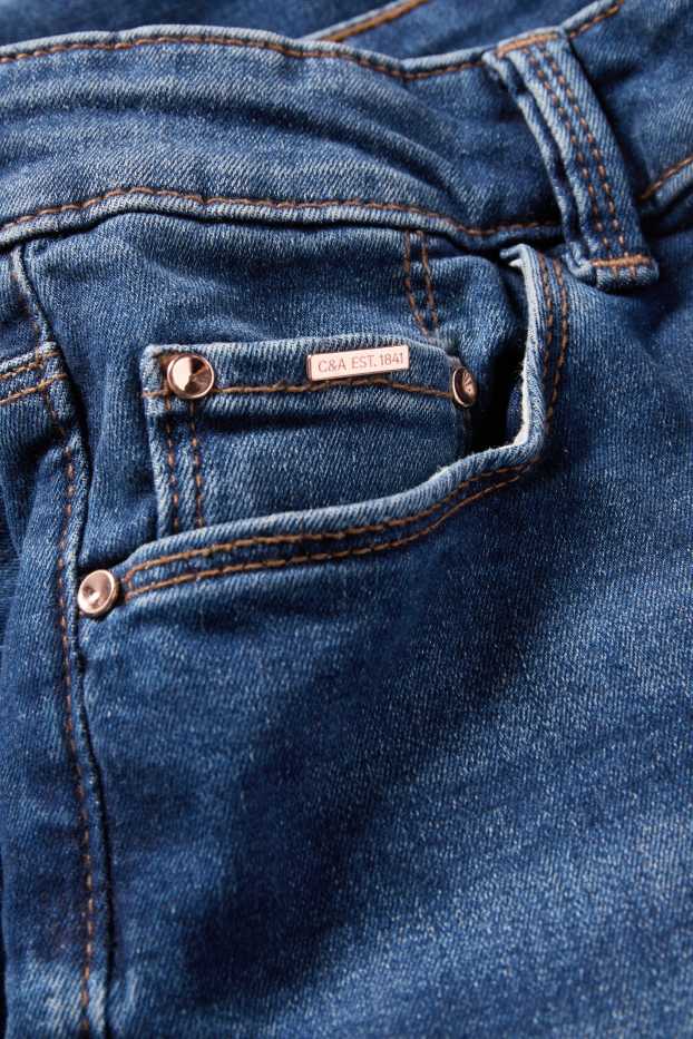 Femei - Skinny jeans - talie medie - jeans modelatori - LYCRA® - albastru închis