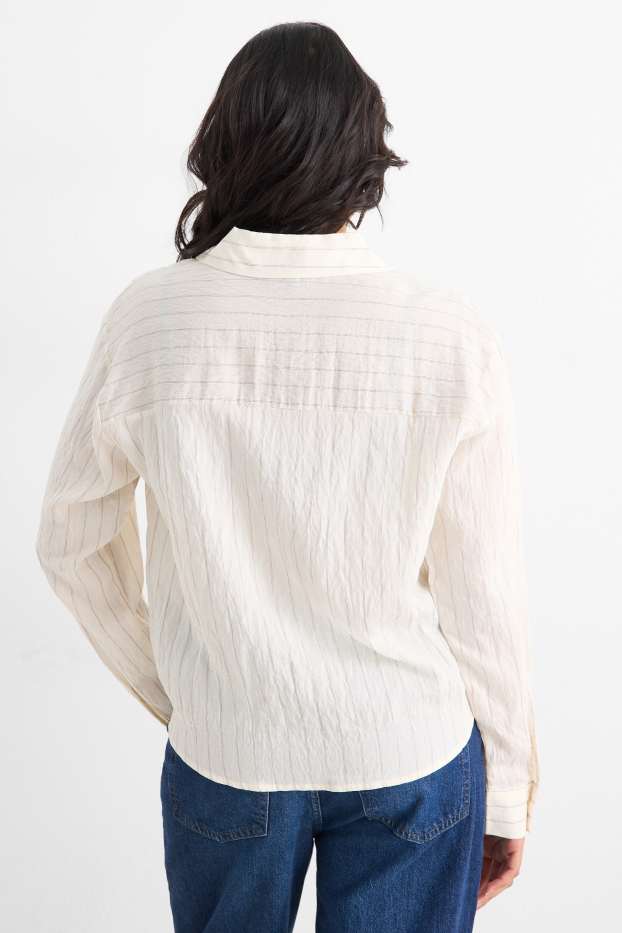 Dames - Blouse met knoop in de stof - gestreept - crème wit