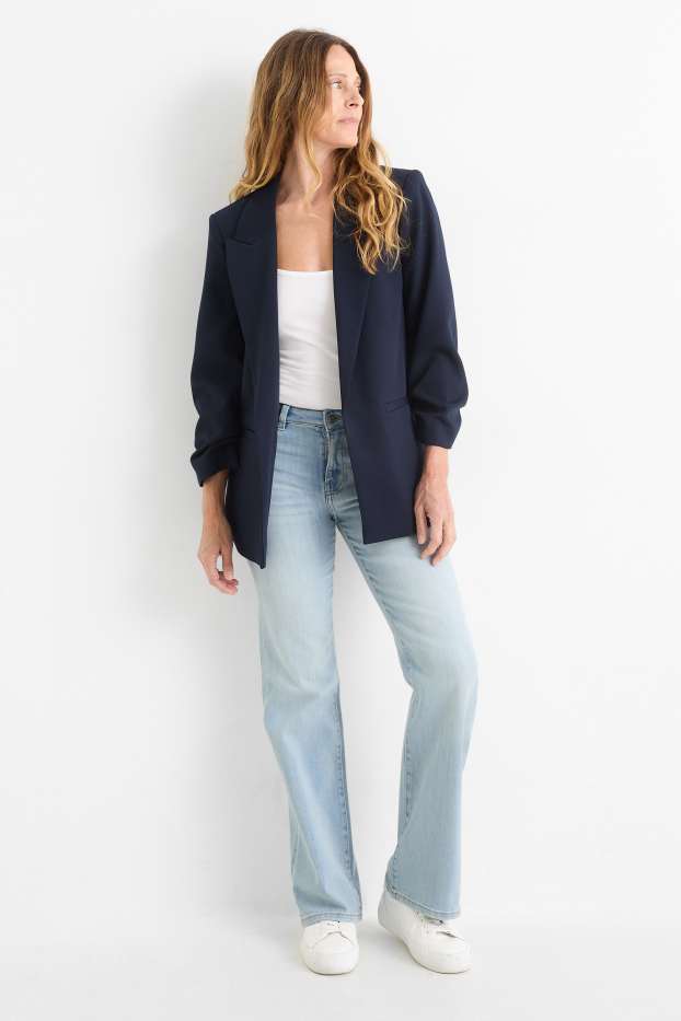 Femei - Flared jeans - talie medie - albastru deschis