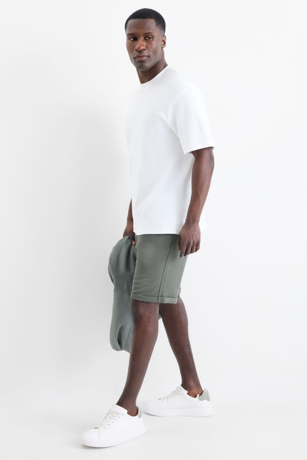 Uomo - Shorts di felpa - tessuto tramato - verde