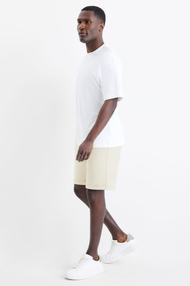 Uomo - Shorts di felpa - tessuto tramato - bianco crema