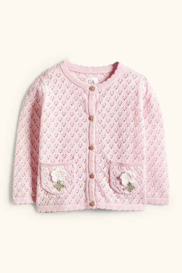 Baby: meisjes - Bloemetje - babycardigan met gehaakte versiering - roze