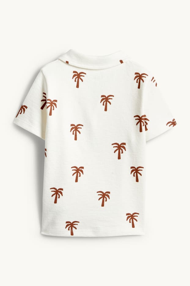 Nen - Palmeres - polo - marró / blanc trencat