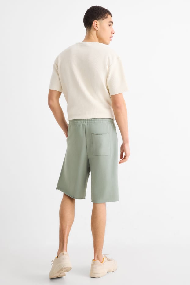 Bărbați - Pantaloni scurți de trening - verde deschis