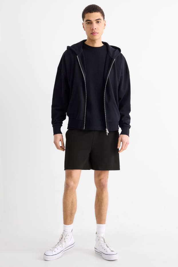 Bărbați - Pantaloni scurți de trening - negru