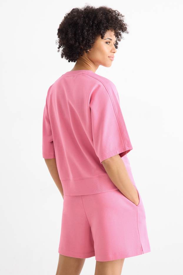 Dona - Dessuadora - fúcsia