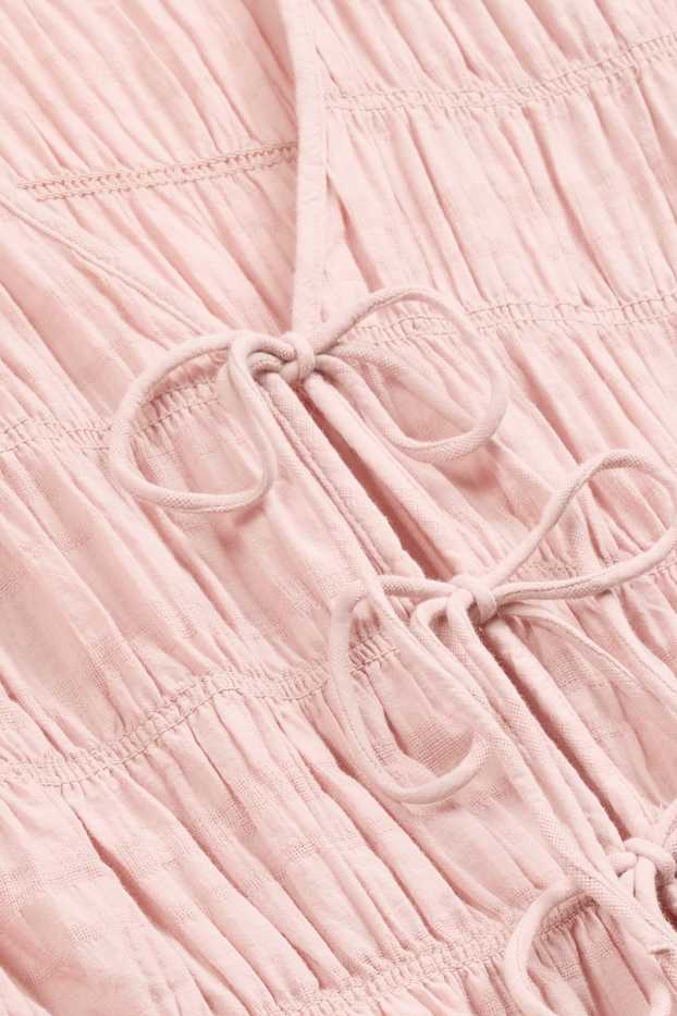 Femmes - Chemisier avec encolure en V - finition smockée - rose